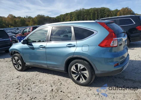 2015 Honda Cr-V Touring z USA, uszkodzony, nr VIN 5J6RM4H92FL000248